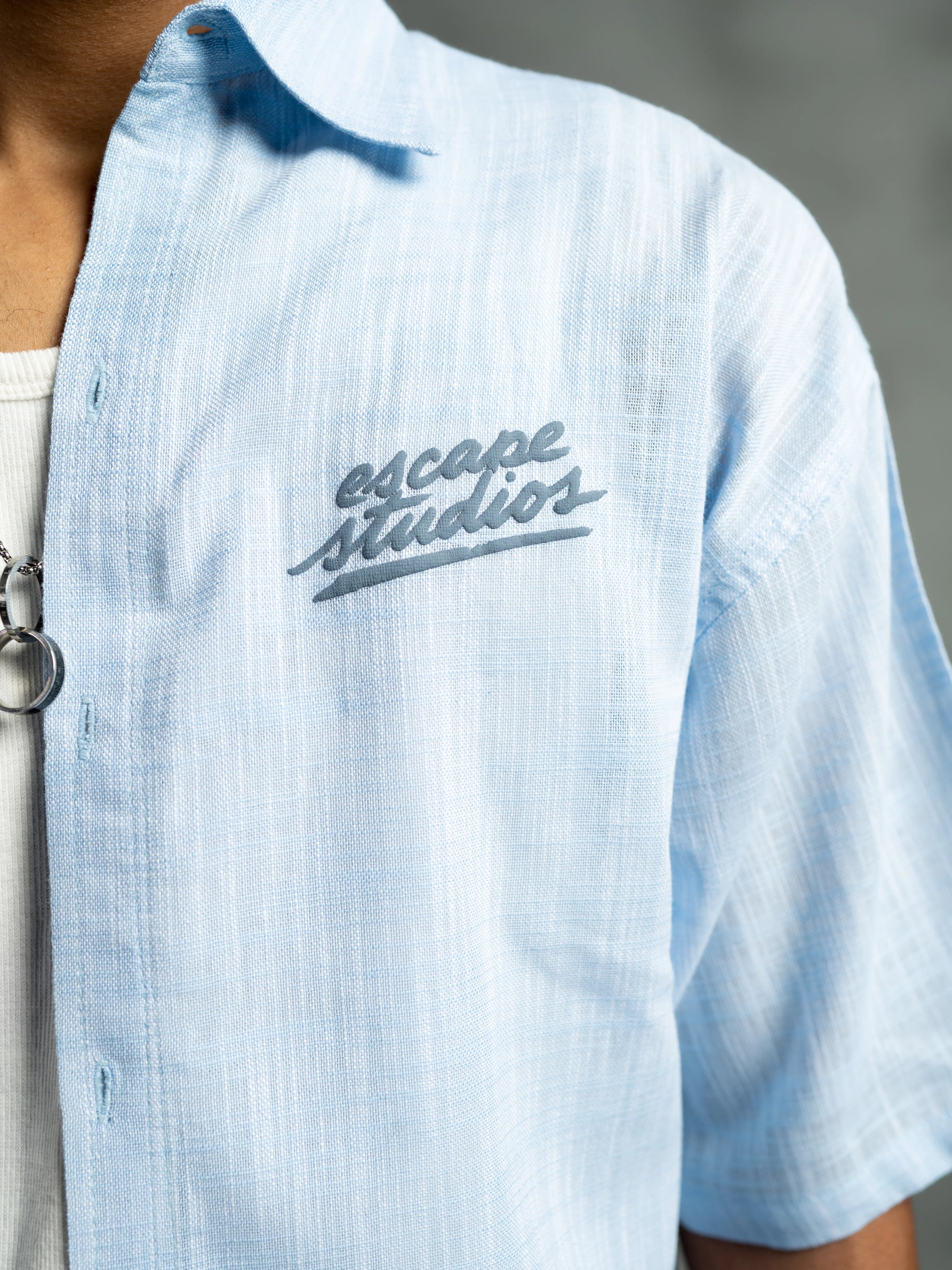 STUDIO BUTTON DOWN